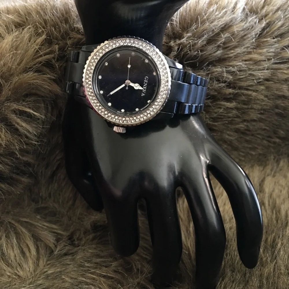 Ladies Geneva black plastic band rhinestone watch